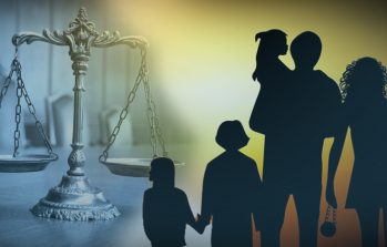 a family in front of a legal scale